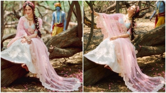 For her look, she chose a pastel-hued lehenga with a sky blue and pink blouse embellished with intricate patterns and silver detailing. She paired it with a blue lehenga skirt embellished with silver hand-made embroidery, which exuded a regal air. (Instagram/@tamannaahspeaks)