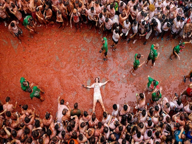 After the fracas was over, a cleaning crew armed with hoses was sent to clear the debris from the city's streets, which were left sparkling clean thanks to the natural acidity of the tomatoes. The fruits, grown specifically for the festival, are considered too acidic for human consumption. (Image: Reuters)